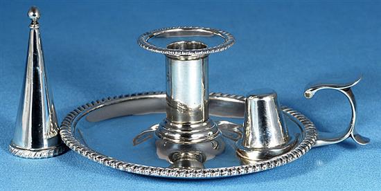 An unusual early Victorian silver chamberstick, by Robert Garrard II, Width 180mm weight 12.2oz/382grms